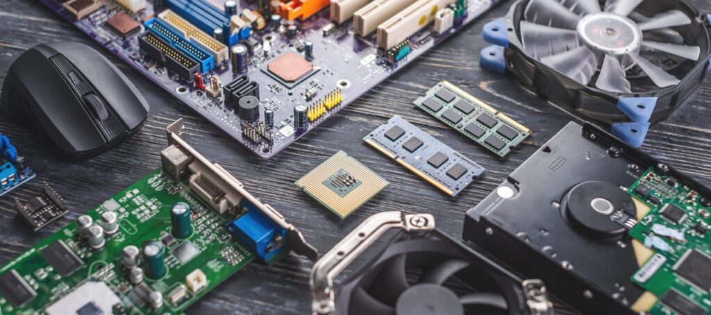 Different Computer Hardware laid out neatly.